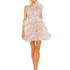 A woman in a Tulle Ruffle One Shoulder Mini Dress and strappy heels stands against a white background.