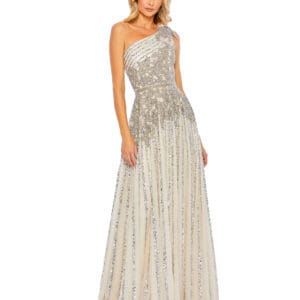 A woman stands against a white background wearing the Nude Beaded Embellished One Shoulder A Line Gown, featuring a floor-length silver and nude sequin pattern.